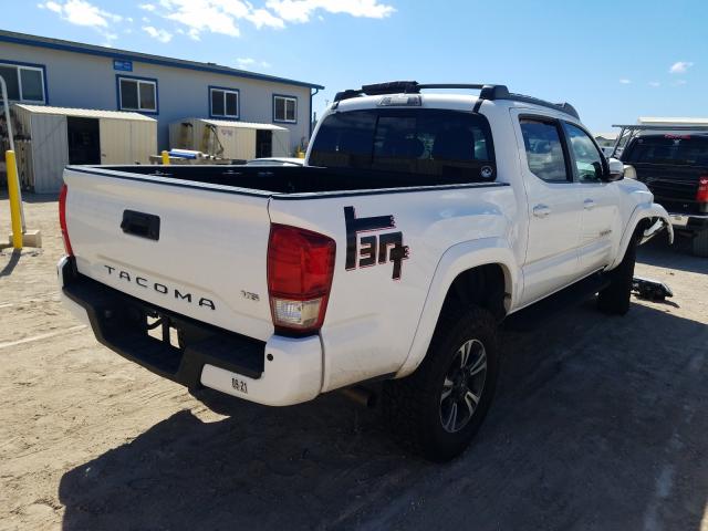 Photo 4 from auction – 2017 TOYOTA TACOMA DOU with VIN 3TMAZ5CN6HM040400