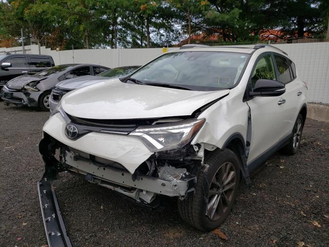 Photo 2 from auction – 2018 TOYOTA RAV4 LIMIT with VIN JTMDFREV6JJ206430