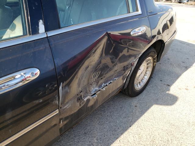 Photo 9 from auction – 1998 LINCOLN TOWN CAR E with VIN 1LNFM81W9WY667770