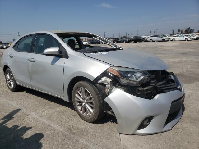 TOYOTA COROLLA L 2014 with VIN 5YFBURHEXEP140359 - Photo from auction