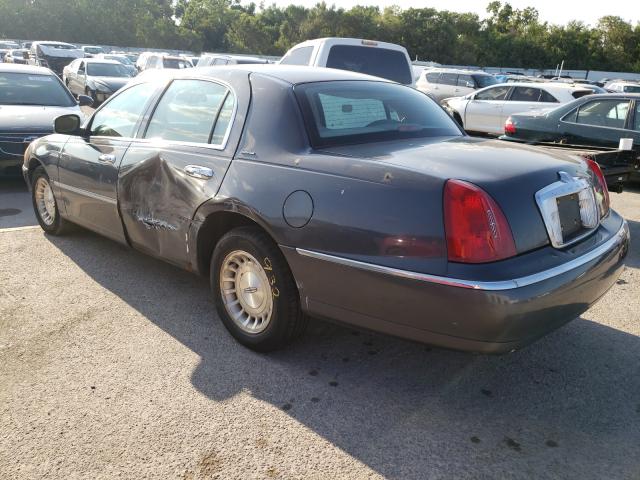 Photo 3 from auction – 1998 LINCOLN TOWN CAR E with VIN 1LNFM81W9WY667770