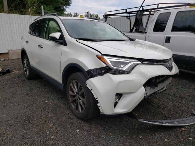 TOYOTA RAV4 LIMIT 2018 with VIN JTMDFREV6JJ206430 - Photo from auction