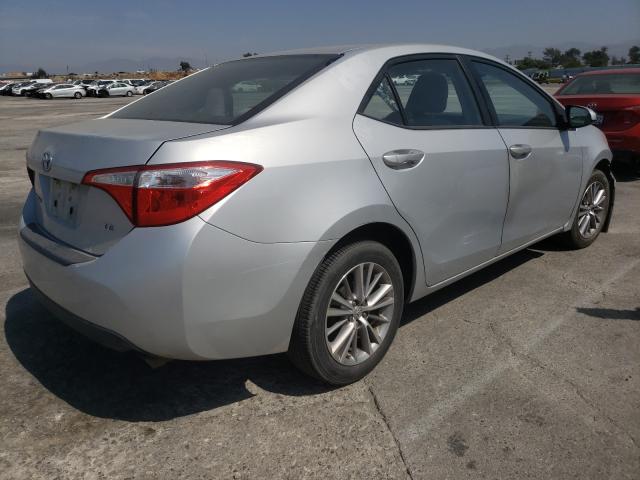 Photo 4 from auction – 2014 TOYOTA COROLLA L with VIN 5YFBURHEXEP140359