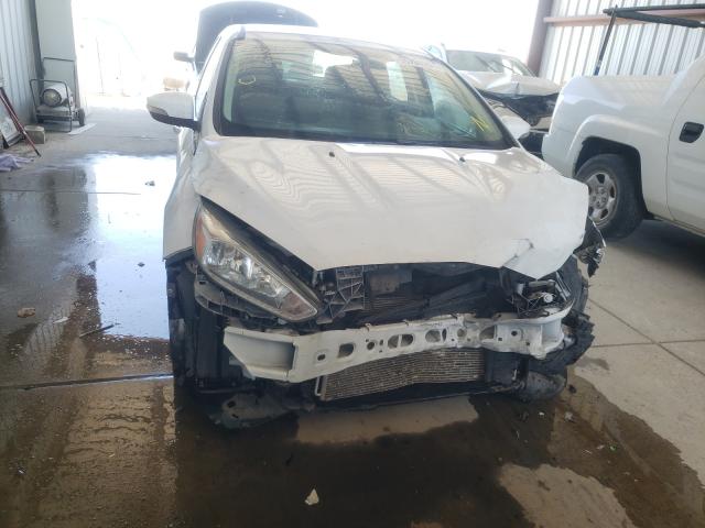 Photo 9 from auction – 2016 FORD FOCUS SE with VIN 1FADP3F21GL390628