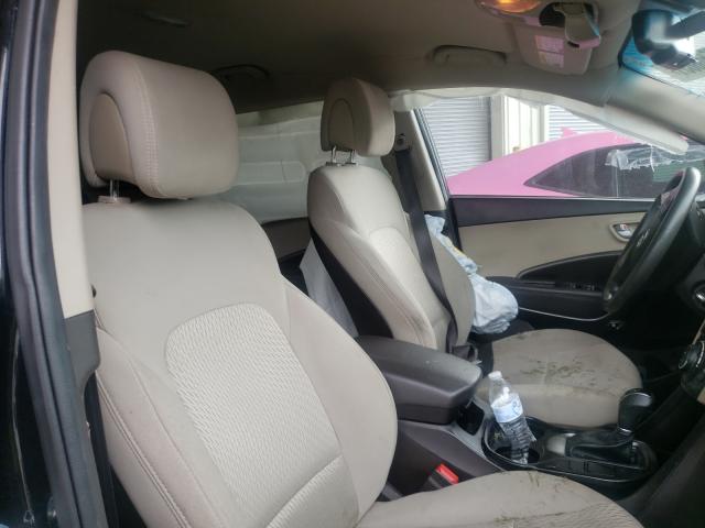 Photo 5 from auction – 2017 HYUNDAI SANTA FE S with VIN 5NMZU3LB3HH010799