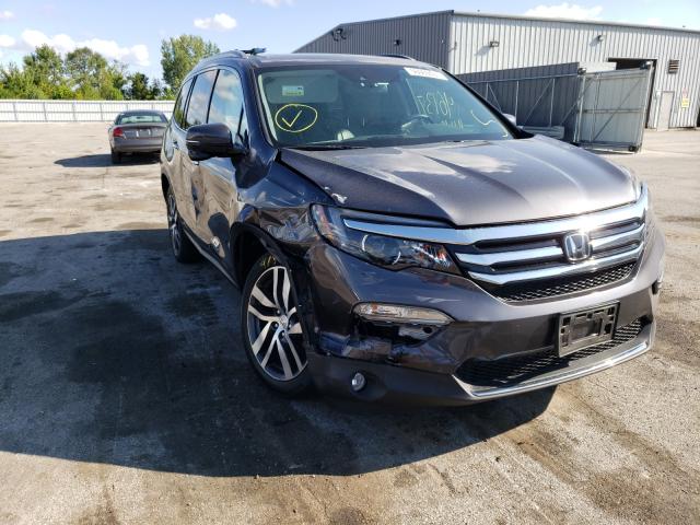 Photo 9 from auction – 2017 HONDA PILOT TOUR with VIN 5FNYF5H98HB020740