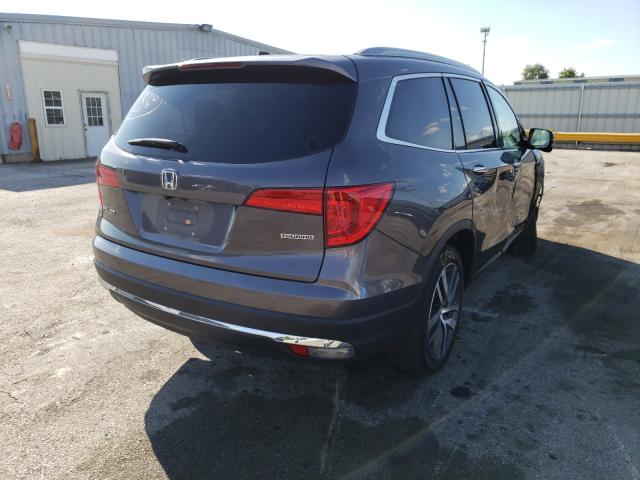 Photo 4 from auction – 2017 HONDA PILOT TOUR with VIN 5FNYF5H98HB020740