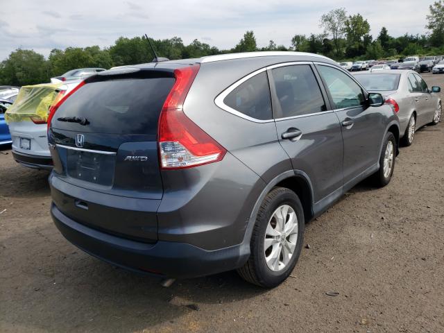Photo 4 from auction – 2014 HONDA CR-V EXL with VIN 5J6RM4H79EL043157