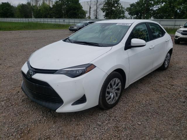 Photo 2 from auction – 2018 TOYOTA COROLLA L with VIN 5YFBURHE5JP826674