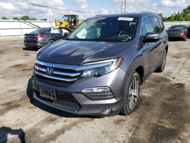 Photo 2 from auction – 2017 HONDA PILOT TOUR with VIN 5FNYF5H98HB020740