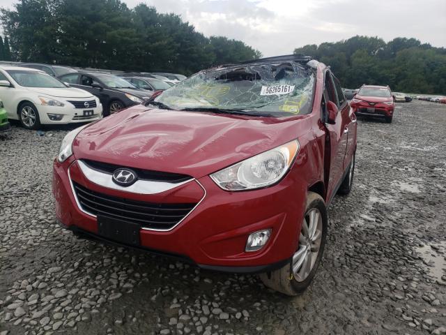 Photo 7 from auction – 2012 HYUNDAI TUCSON GLS with VIN KM8JUCAC3CU513142