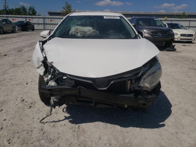 Photo 9 from auction – 2014 TOYOTA COROLLA L with VIN 2T1BURHE9EC223734