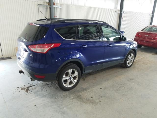 Photo 4 from auction – 2014 FORD ESCAPE SE with VIN 1FMCU9G91EUA77370