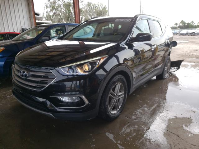 Photo 2 from auction – 2017 HYUNDAI SANTA FE S with VIN 5NMZU3LB4HH019396