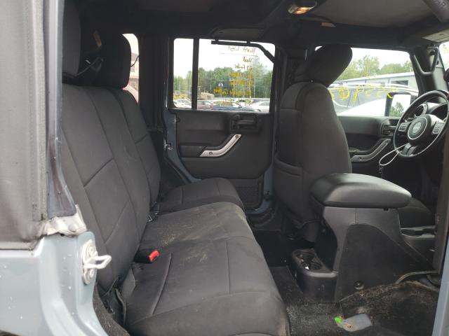 Photo 6 from auction – 2015 JEEP WRANGLER U with VIN 1C4BJWFG6FL551019