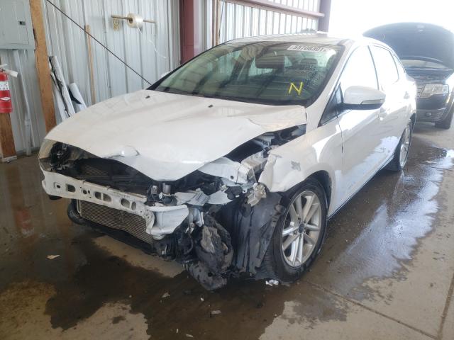 Photo 2 from auction – 2016 FORD FOCUS SE with VIN 1FADP3F21GL390628