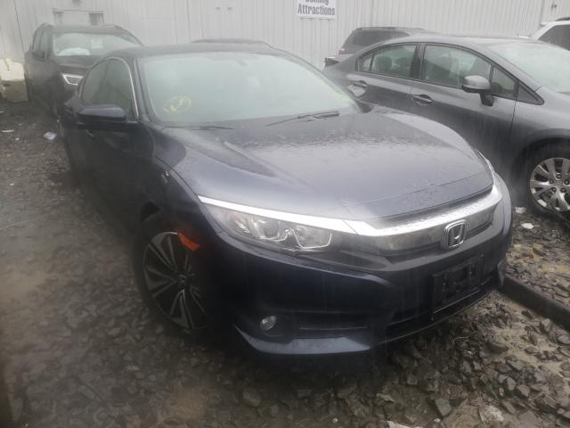 HONDA CIVIC EX 2016 with VIN 19XFC1F3XGE211541 - Photo from auction