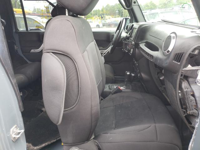 Photo 5 from auction – 2015 JEEP WRANGLER U with VIN 1C4BJWFG6FL551019