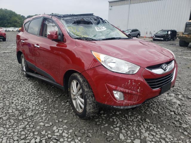 HYUNDAI TUCSON GLS 2012 with VIN KM8JUCAC3CU513142 - Photo from auction