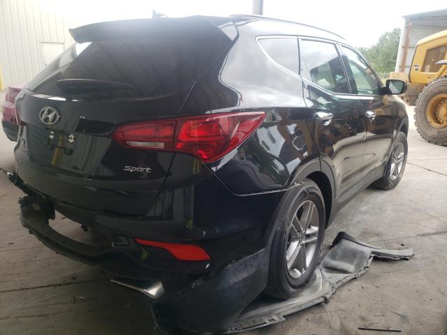 Photo 4 from auction – 2017 HYUNDAI SANTA FE S with VIN 5NMZU3LB3HH010799
