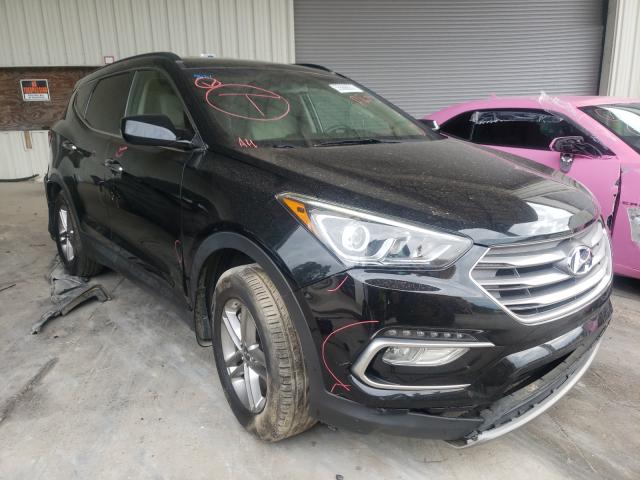 HYUNDAI SANTA FE S 2017 with VIN 5NMZU3LB3HH010799 - Photo from auction