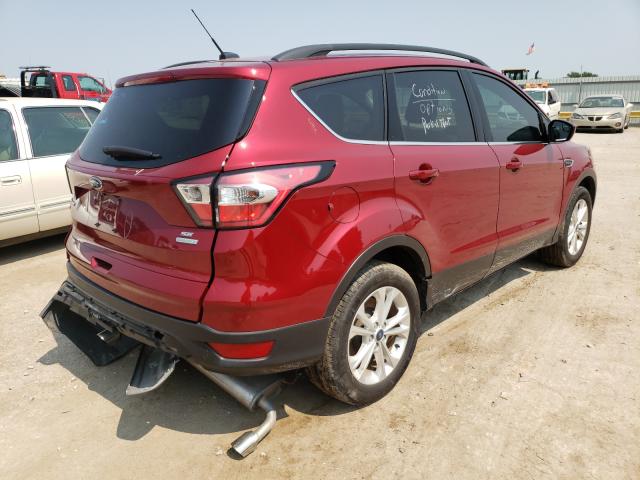 Photo 4 from auction – 2018 FORD ESCAPE SE with VIN 1FMCU0GD4JUA22471