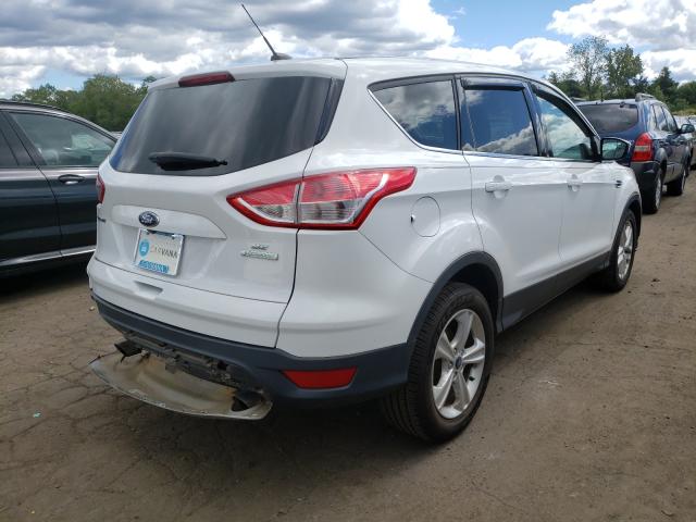 Photo 4 from auction – 2016 FORD ESCAPE SE with VIN 1FMCU0GX3GUB43401