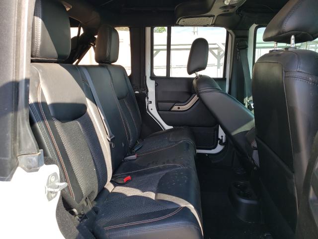 Photo 6 from auction – 2016 JEEP WRANGLER U with VIN 1C4BJWEG2GL330830