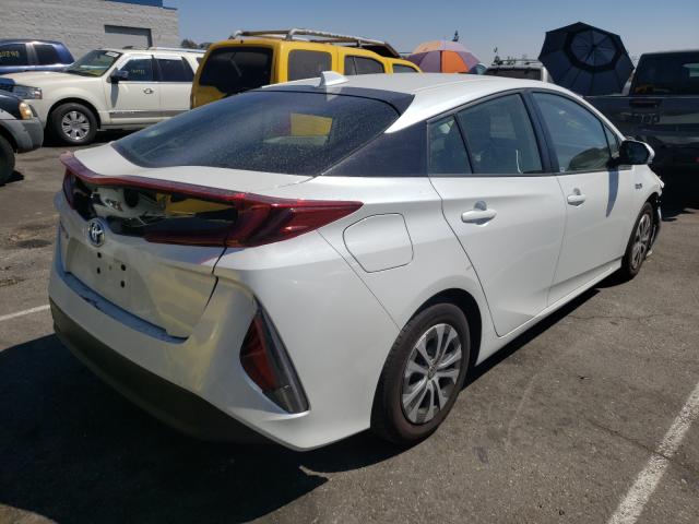 Photo 4 from auction – 2021 TOYOTA PRIUS PRIM with VIN JTDKAMFP4M3168794