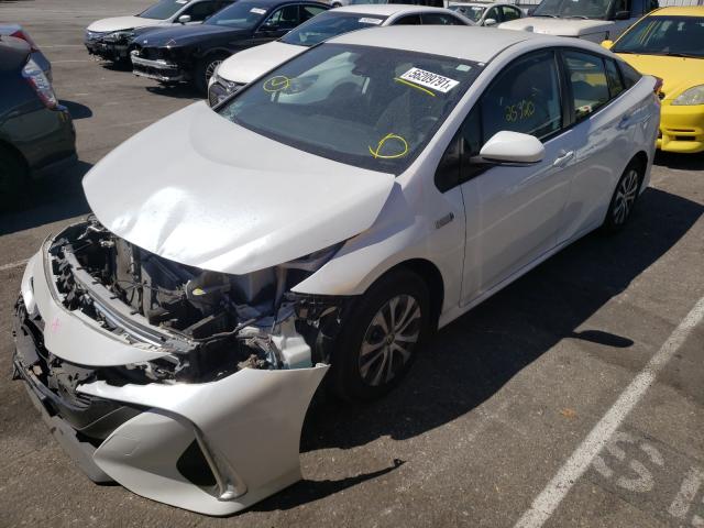 Photo 2 from auction – 2021 TOYOTA PRIUS PRIM with VIN JTDKAMFP4M3168794