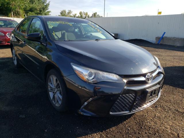 TOYOTA CAMRY LE 2015 with VIN 4T1BF1FK8FU110703 - Photo from auction