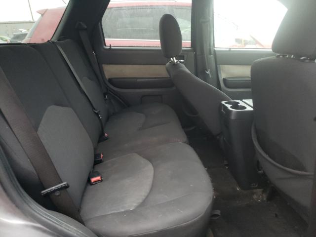 Photo 6 from auction – 2009 MERCURY MARINER with VIN 4M2CU81G09KJ10120