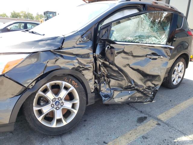 Photo 9 from auction – 2016 FORD ESCAPE TIT with VIN 1FMCU9JX7GUB22905