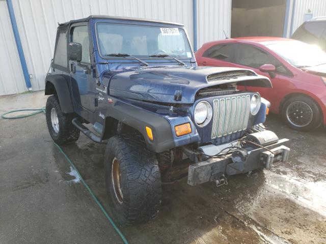 JEEP WRANGLER / 2000 with VIN 1J4FA49S4YP734494 - Photo from auction