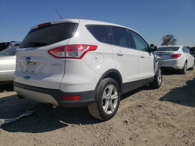Photo 4 from auction – 2016 FORD ESCAPE SE with VIN 1FMCU0GX9GUB39174