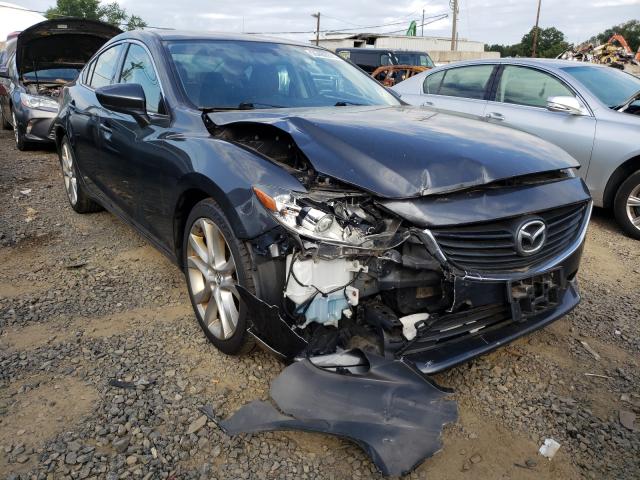 MAZDA 6 TOURING 2014 with VIN JM1GJ1V67E1132284 - Photo from auction