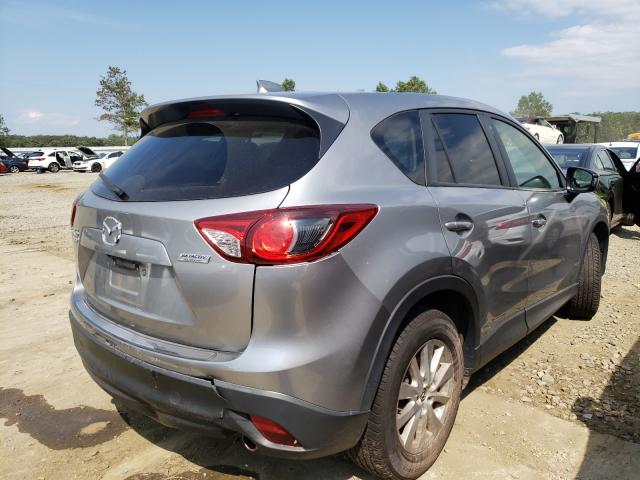 Photo 4 from auction – 2014 MAZDA CX-5 TOURI with VIN JM3KE4CY1E0424515