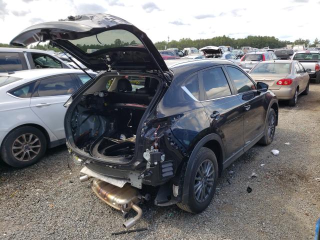 Photo 4 from auction – 2021 MAZDA CX-5 TOURI with VIN JM3KFACM8M1300839