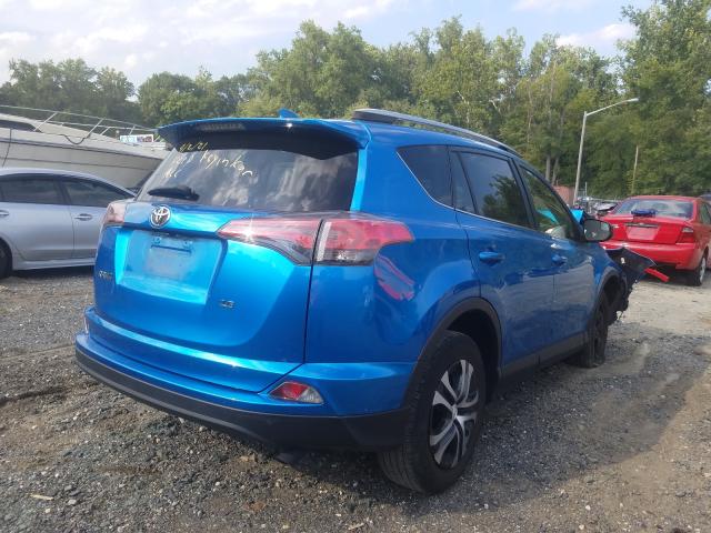 Photo 4 from auction – 2017 TOYOTA RAV4 LE with VIN JTMZFREV6HJ711545