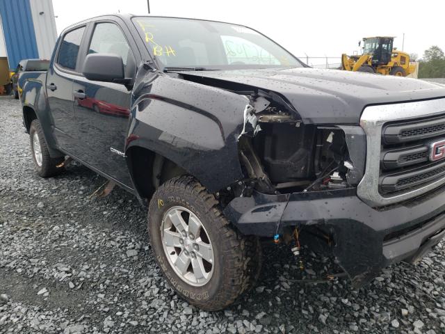 Photo 9 from auction – 2015 GMC CANYON with VIN 1GTG5AE33F1211267