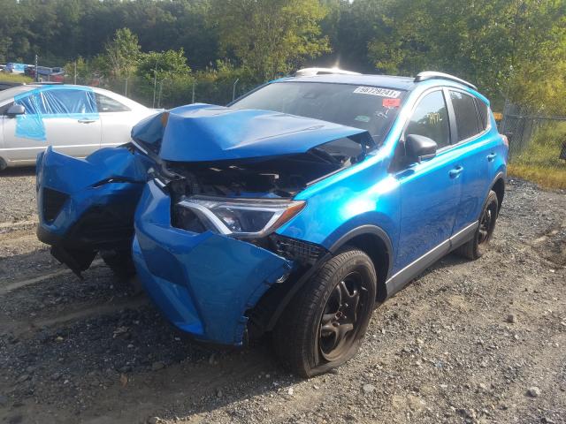 Photo 2 from auction – 2017 TOYOTA RAV4 LE with VIN JTMZFREV6HJ711545