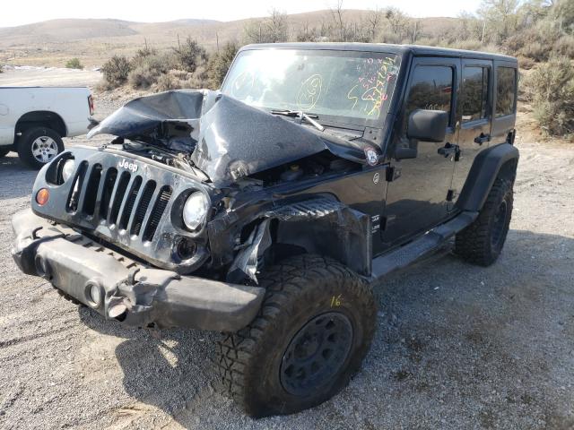 Photo 2 from auction – 2013 JEEP WRANGLER U with VIN 1C4BJWDGXDL515771