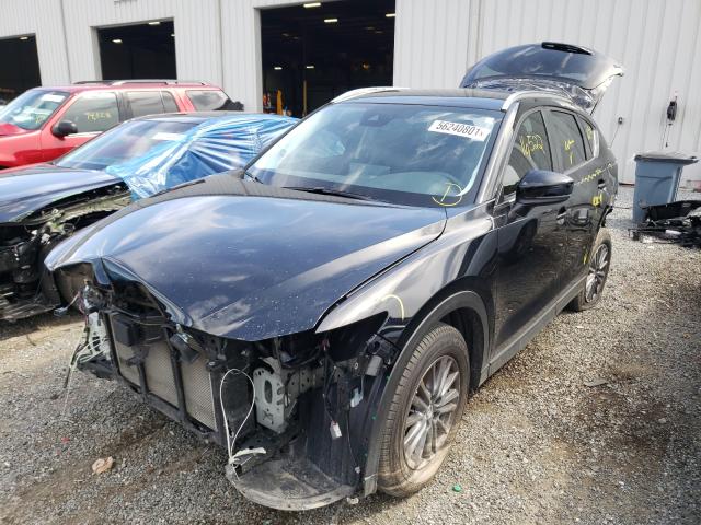 Photo 2 from auction – 2021 MAZDA CX-5 TOURI with VIN JM3KFACM8M1300839