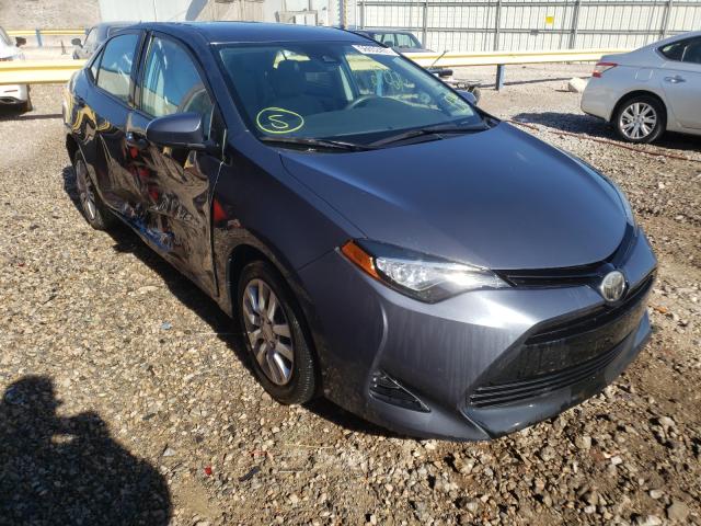 TOYOTA COROLLA L 2017 with VIN 5YFBURHEXHP597600 - Photo from auction