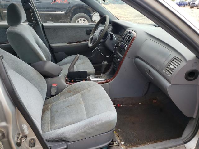 Photo 5 from auction – 2004 KIA OPTIMA EX with VIN KNAGD128145355566