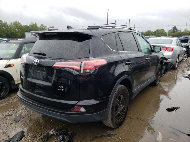 Photo 4 from auction – 2017 TOYOTA RAV4 LE with VIN 2T3BFREV8HW630887