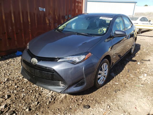 Photo 2 from auction – 2017 TOYOTA COROLLA L with VIN 5YFBURHEXHP597600