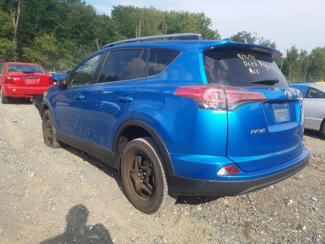 Photo 3 from auction – 2017 TOYOTA RAV4 LE with VIN JTMZFREV6HJ711545