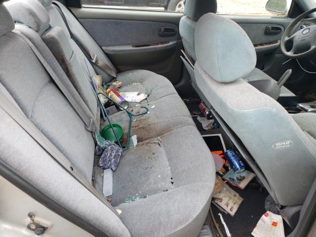 Photo 6 from auction – 2004 KIA OPTIMA EX with VIN KNAGD128145355566