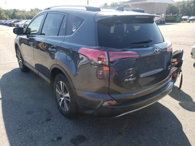 Photo 3 from auction – 2017 TOYOTA RAV4 XLE with VIN JTMRFREV4HJ123465